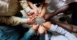 hand joined together in prayer