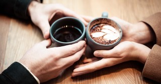 Friends talking over coffee