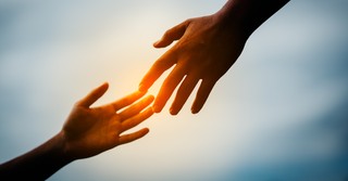 hands reaching out for help
