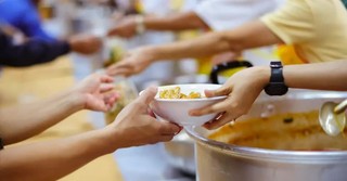 volunteers at a soup kitchen