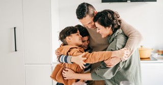 Family hugging; secure family