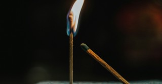 A burning match and an unlit match