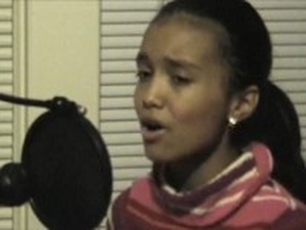 11 Year Old Girl Beautifully Sings Amazing Grace