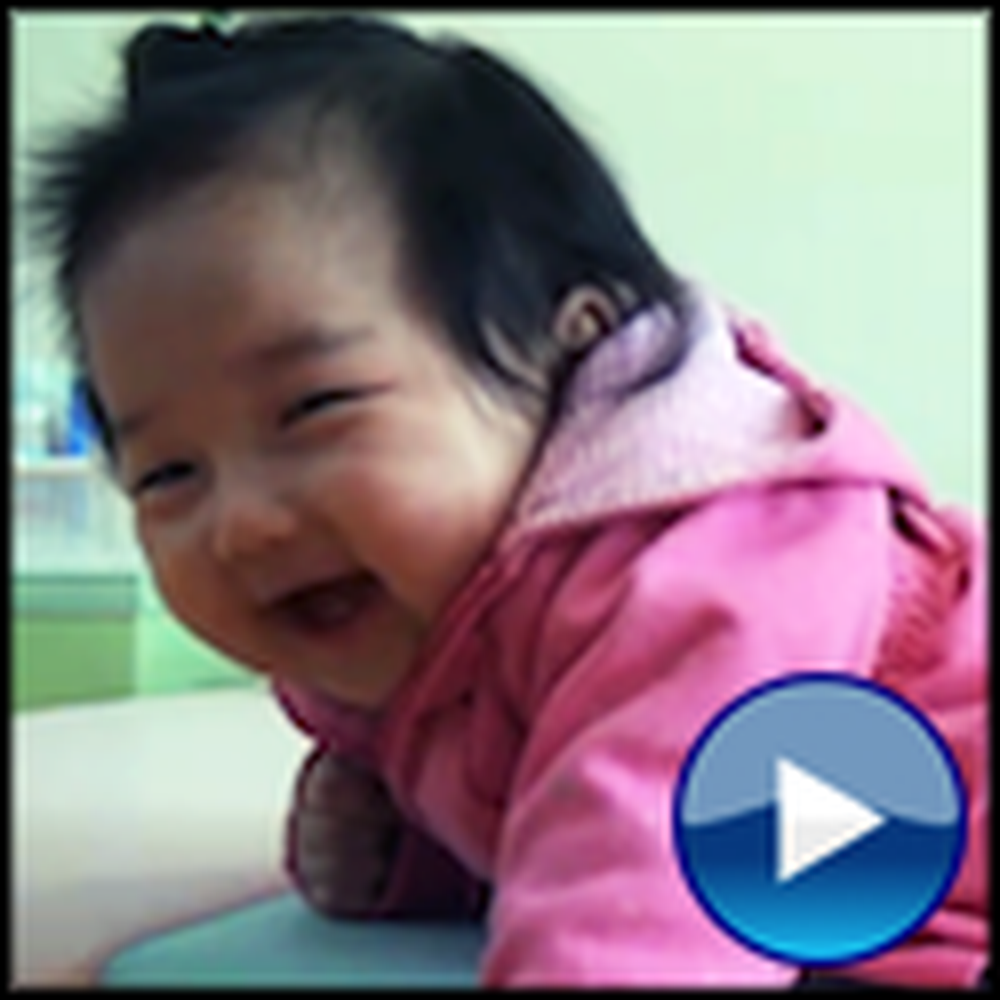 Super Adorable Baby Finds Tape Absolutely Hilarious