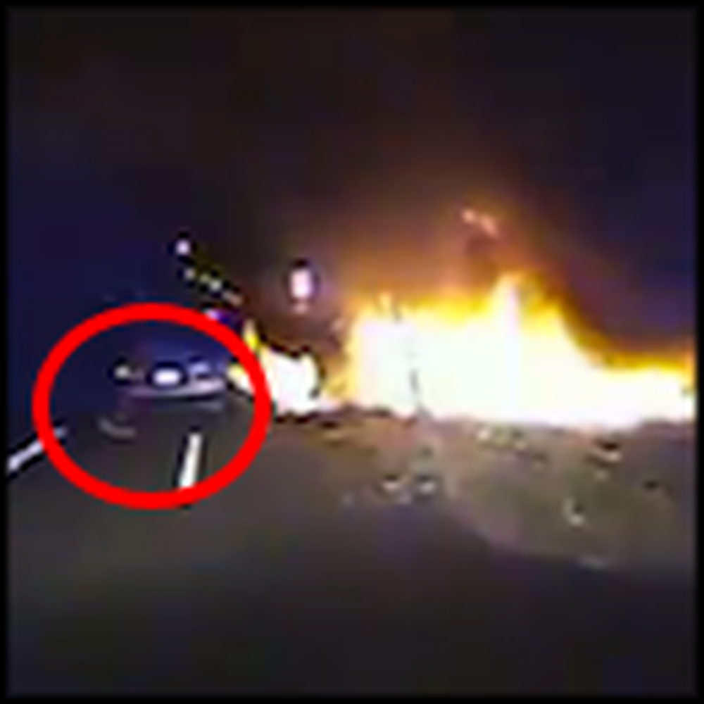 Officer Risks his Life to Save a Man From a Burning Vehicle