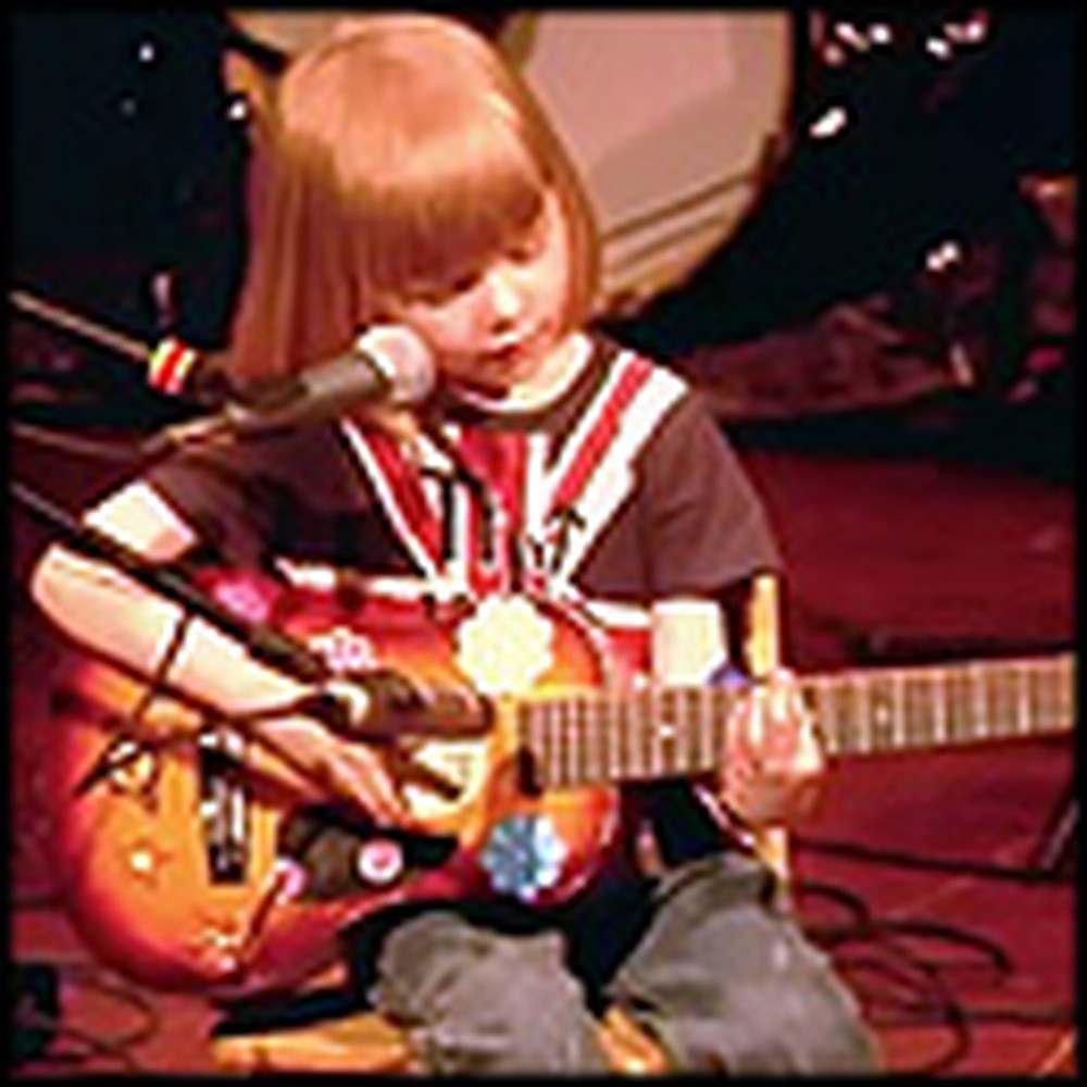The Cutest 5 Year-Old Plays a Classic Song by Johnny Cash