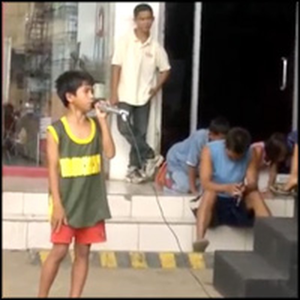 Poor Street Child Steps Up to a Karaoke Machine and Sings a Great Song