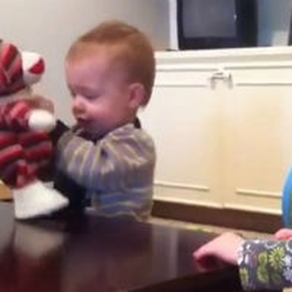 Twin Babies Dance With a Singing Toy Monkey
