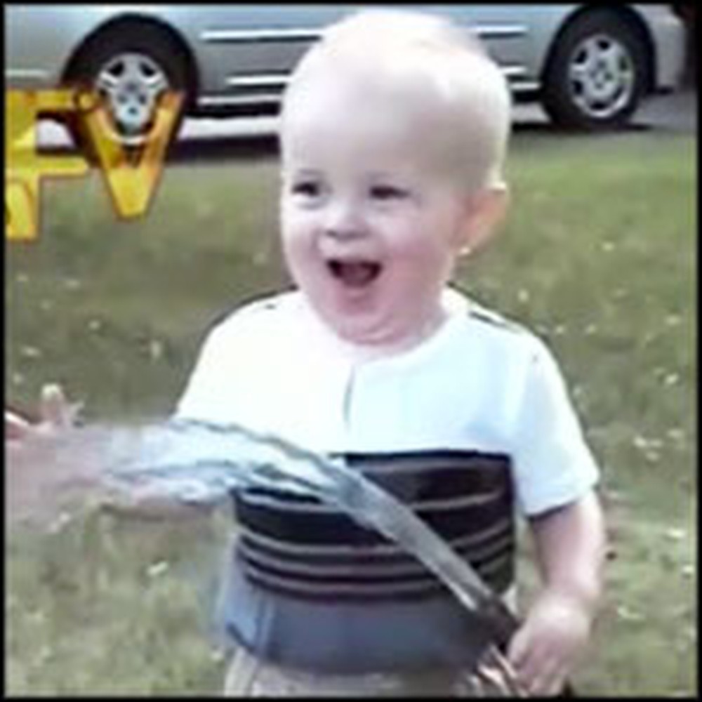 Cute Baby Tries to Drink Water From a Hose