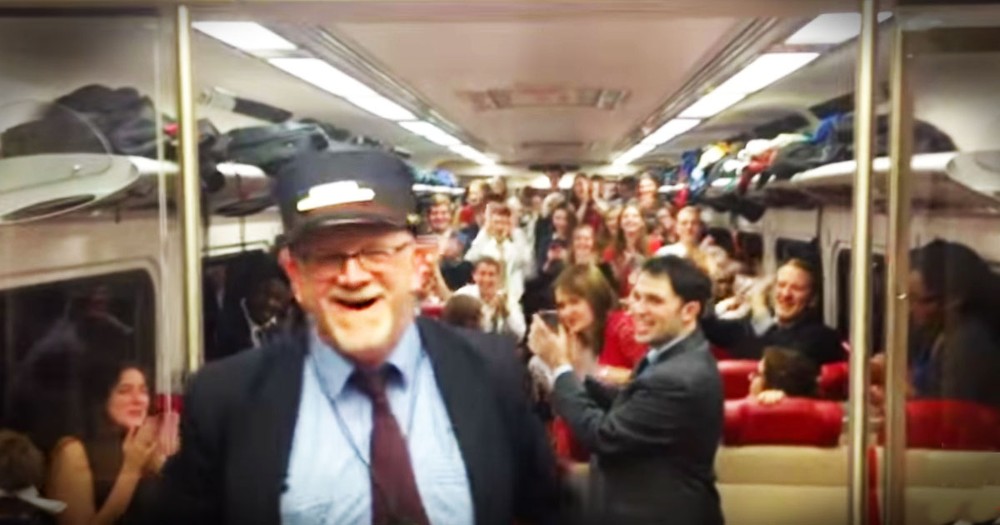 Train Conductors Turns Choir Conductor For Impromptu Christmas Performance