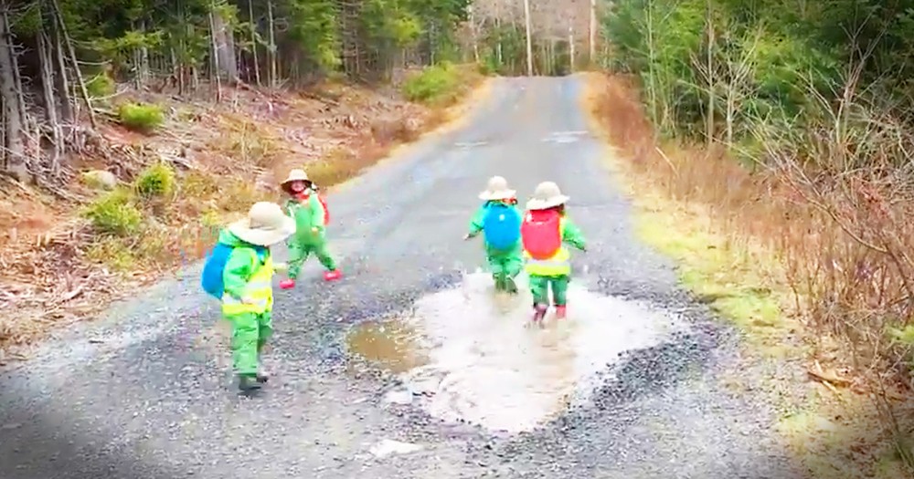 Tiny Kids And A Big Puddle Will Make Your Day