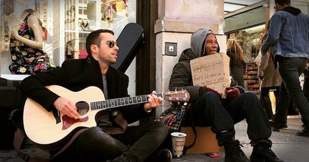Musician Sits Next To The Homeless And Plays To Help Them And It's Making A Huge Difference