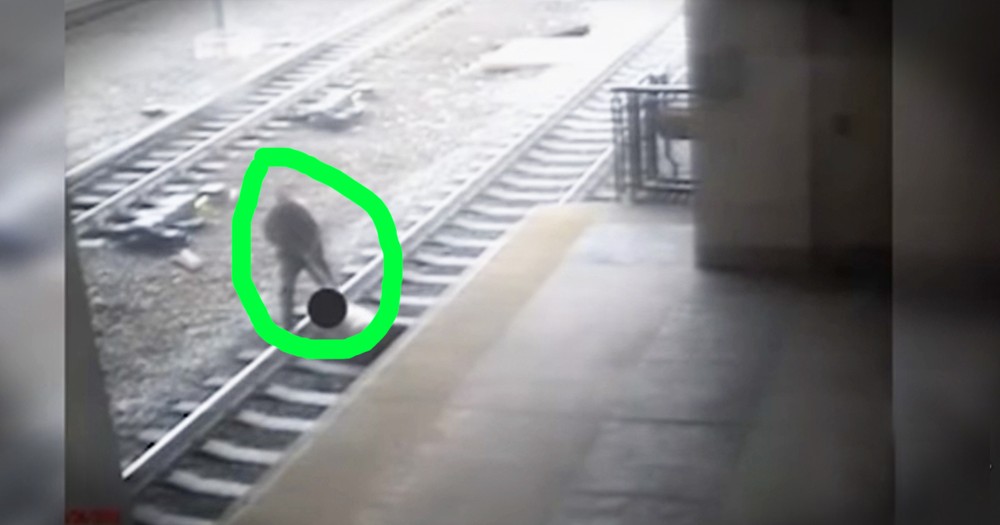Officer Bravely Pulls Man Off Of Tracks Seconds Before Train Rolls By