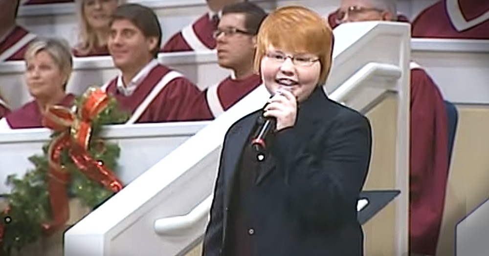 Young Boy Stands In Front Of Church And Sings 'Oh, What a Lovely Name'