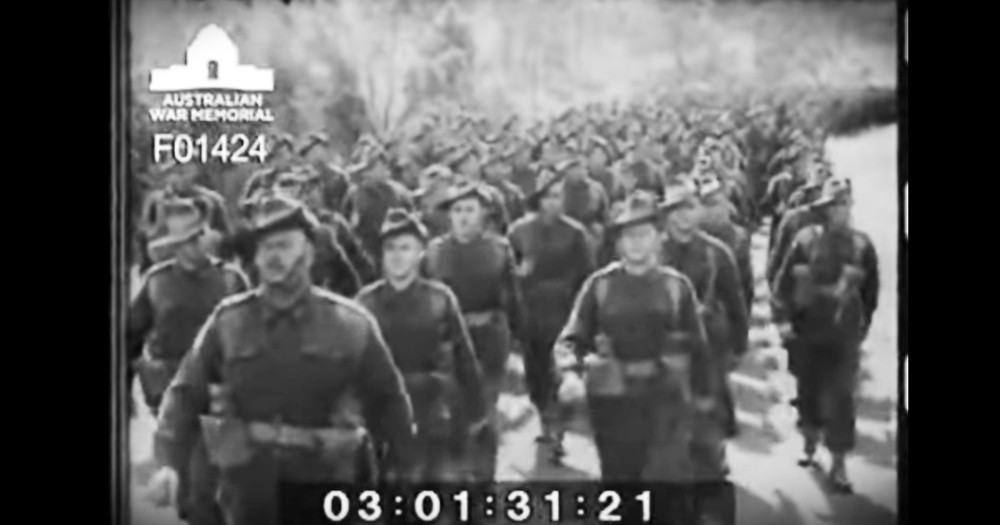 Hauntingly Beautiful Footage Of WWII Soldiers Singing As They March 