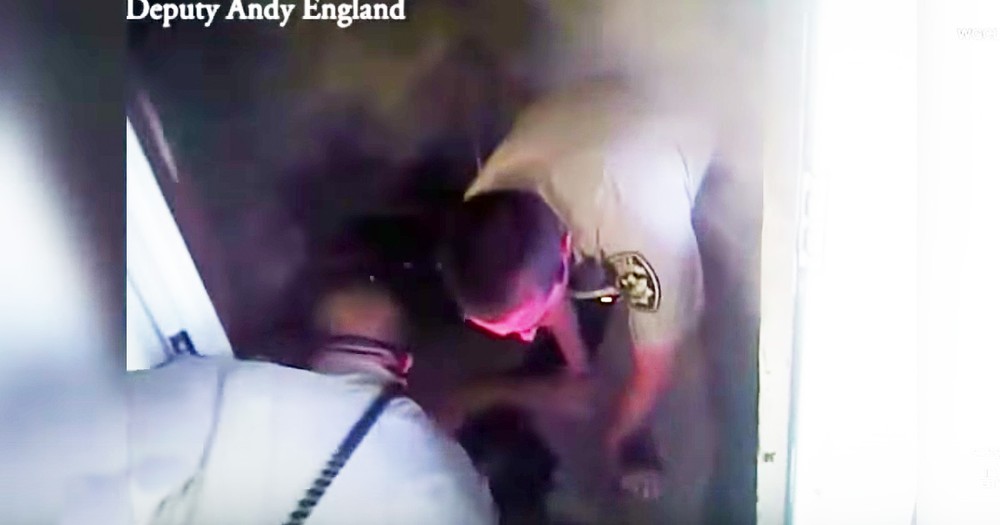 Bodycam Shows Police Officers Rescuing Disabled Man From Burning Home
