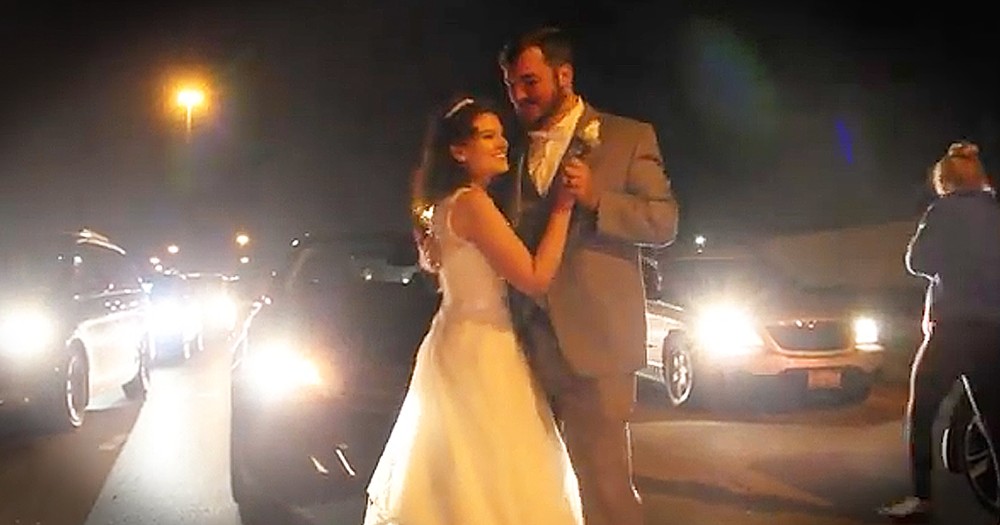 Bride And Groom Share Their First Dance On The Freeway During Traffic Jam