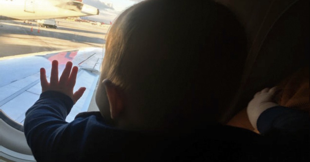 Stranger On A Plane Takes A Dad's 8-Month-Old Son