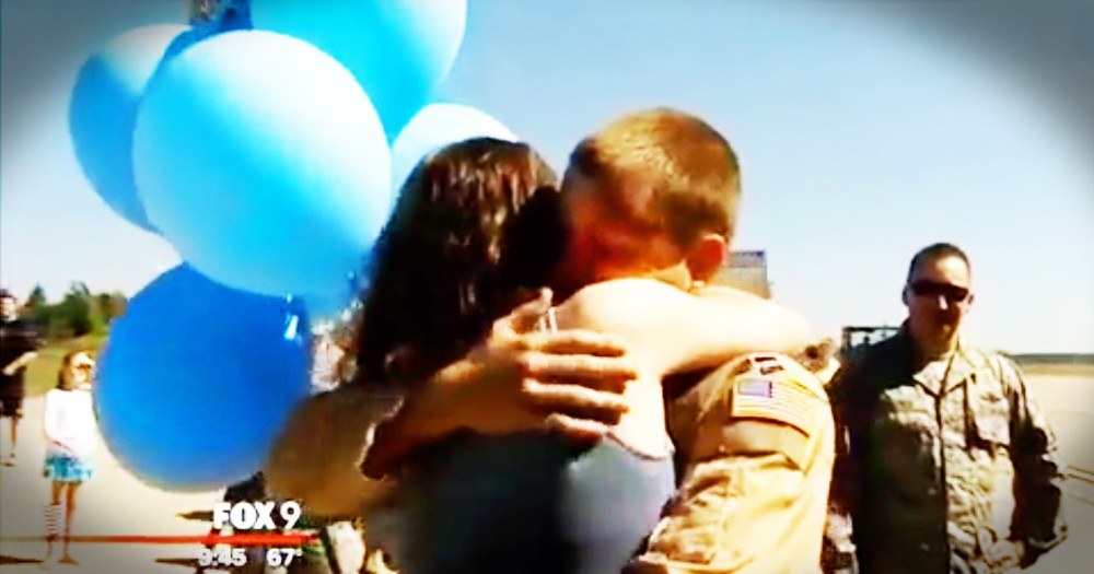 Soldier Returns From Deployment To Find His Wife Holding A Bunch Of Blue Balloons