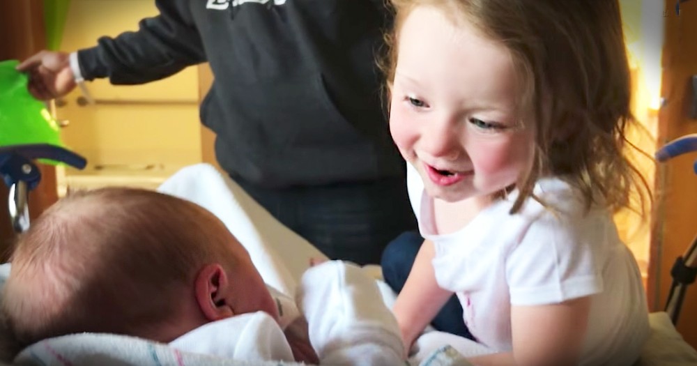 Toddler Meets Her Baby Sister For The First Time