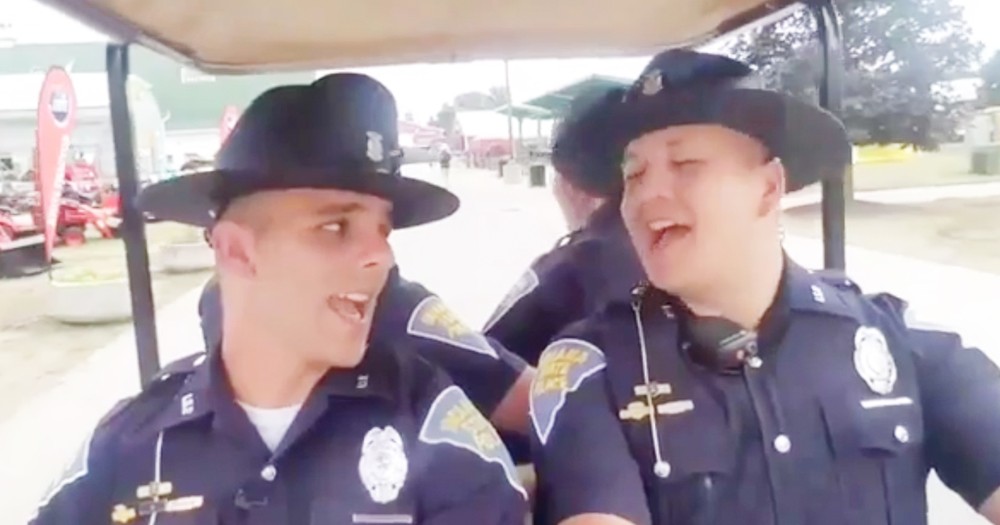 Hilarious Police Officers Lip Sync To 'The Boys Are Back In Town'