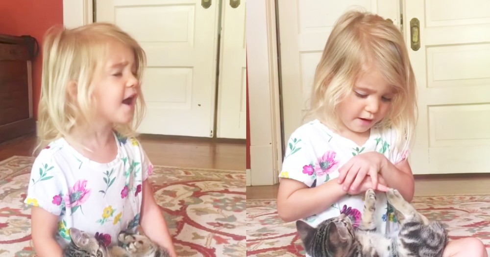 Adorable Little Girl Sings 'Somewhere Over The Rainbow' To Her Kitten