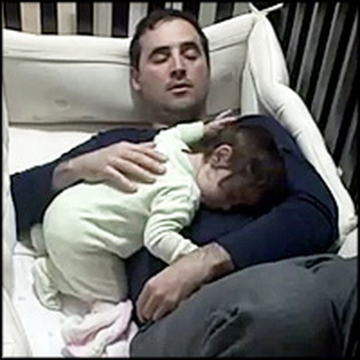 Sweet Daddy Climbs into Crib to Comfort Crying Baby a Heartwarming Video
