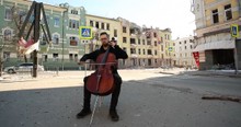 Hauntingly Beautiful Tune Fills The Damaged Streets As Cellist Plays In Ukraine
