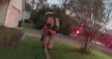 Deputy Runs into Burning House to Help Put out Fire and Then Sees a Blanket That's Wriggling