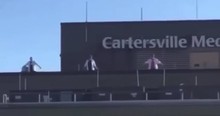 Doctors And Staff Stand On Top Of Hospital In Cartersville Georgia Singing 'Way Maker'