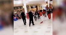 Police Officers Leave Crowd Stunned As They Join In Mall Flash Mob