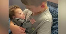 Little Boy Singing To Baby Brother With Down Syndrome Has Hearts Bursting All Over