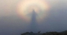 Man Snaps Photo During Sunrise And Sees A Figure In The Clouds