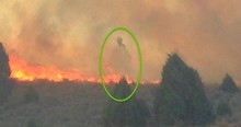 Mysterious Figure Appears Over Cabin Miraculously Spared From Catastrophe