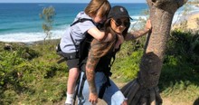 Mom Carries 26-Year-Old Son with Disabilities on Her Back Across the Globe to Fulfill Promise