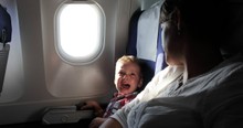 Stranger's Reaction to A Crying Baby on Plane Goes Viral