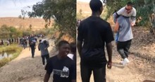 Incredible Moment Students Carry Teacher When The Man's Wheelchair Won't Roll Through Sand