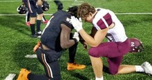 Texas High School Football Player Praying on Field with Opponent Is Beautiful Picture of Unity in Christ