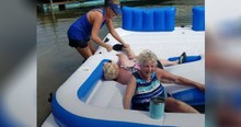 2 Grandmas Can't Stop Laughing Long Enough To Get Off An Inflatable Raft And It's Hilarious
