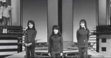 Singing Group Performs Classic Hit In The 1960's