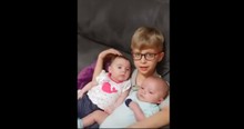 Big Brother Serenades His Baby Siblings With A Lullaby