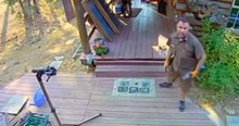 Grizzly Bear Charges, Barely Missing UPS Delivery Man, And Security Cameras Caught It All