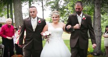 Bride's Dad And Step Dad Walk Her Down The Aisle At Her Wedding
