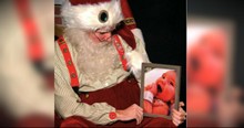 Man Hands Santa A Framed Picture Of The Son He Lost