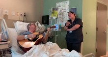 Chemo Patient And Nurse Sing 'O Holy Night' In Hospital Room