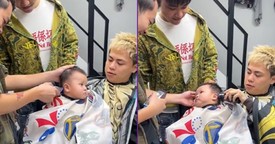 Barbers Take Turns Distracting Client During Haircut