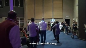 Brain damaged cripple walks out of wheelchair - John Mellor Healing Evangelist 