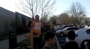 Skateboarders Hear Street Preacher