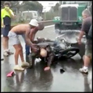 Good Samaritans Heroically Rescue Man Pinned Under Burning Bike