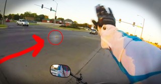 Biker Rescues A Kitten From An Intersection